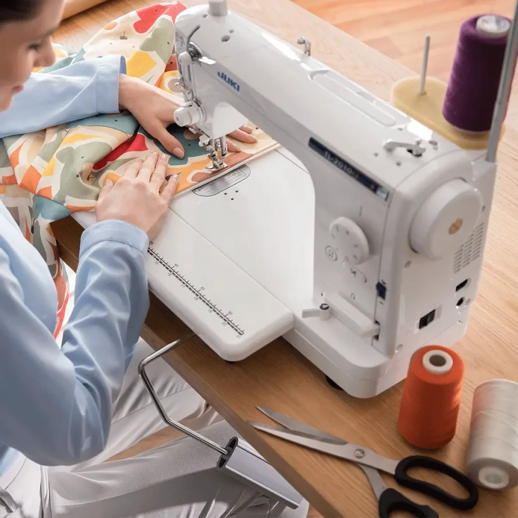 Woman quilting on a Juki TL-2010Q